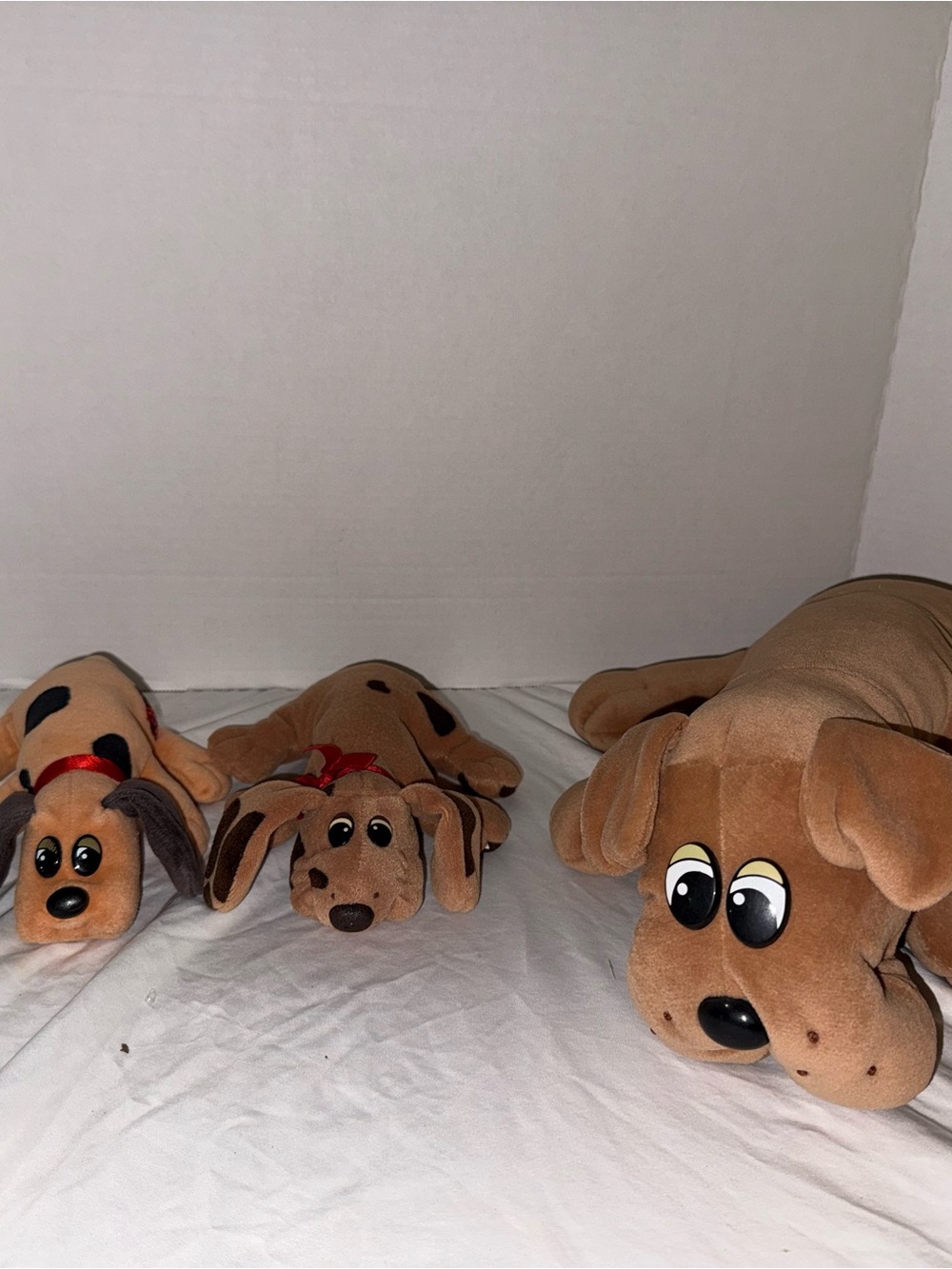 Vintage 1980s pound puppies.  Set of 4.